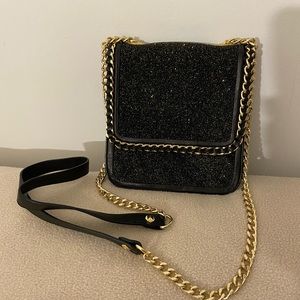 New Henri Bendel evening bag with long shoulder strap.